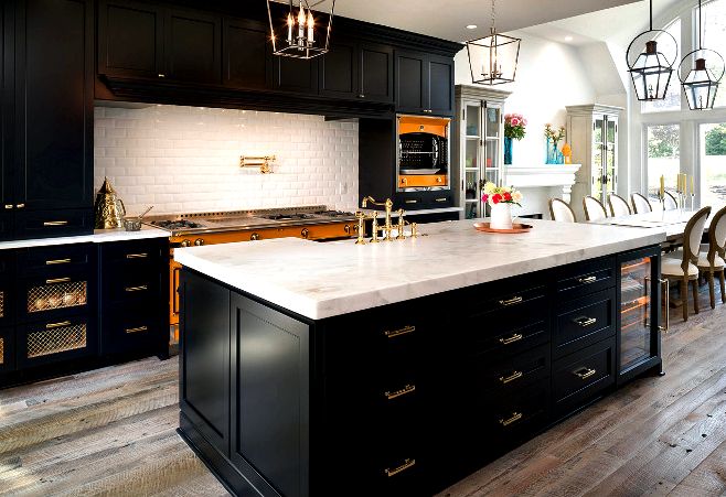 Black kitchen cabinets. Black kitchen cabinets. Black kitchen cabinets with white marble countertop and rustic wide plank wood floor. #Blackkitchen #Blackkitchencabinets black-kitchen-cabinets #rusticwood #rusticwoodfloor #reclaimedwoodfloor Marc Levack. Deborah Scannell Photography