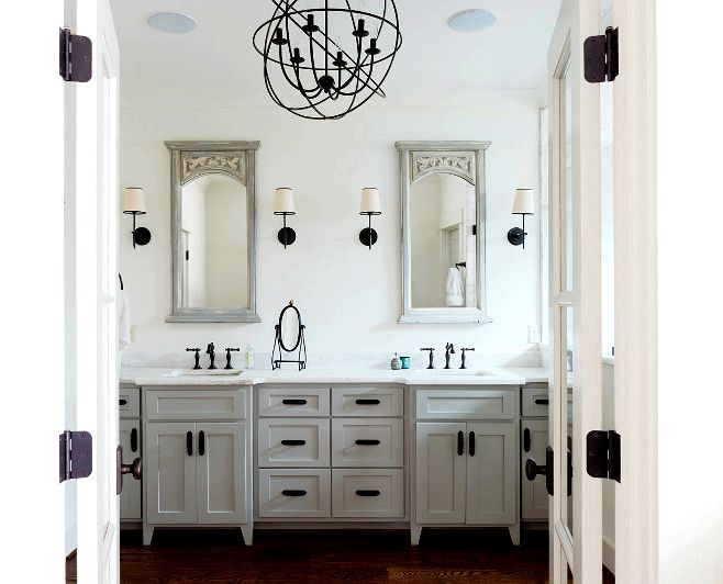 White bathroom with grey vanity. White bathroom with grey vanity and rubbed oil bronze hardware and lighting. #Whitebathroom #greyvanity #rubbedoilbronze #rubbedoilbronzehardware #rubbedoilbronzelighting white-bathroom-with-grey-vanity Willow Homes